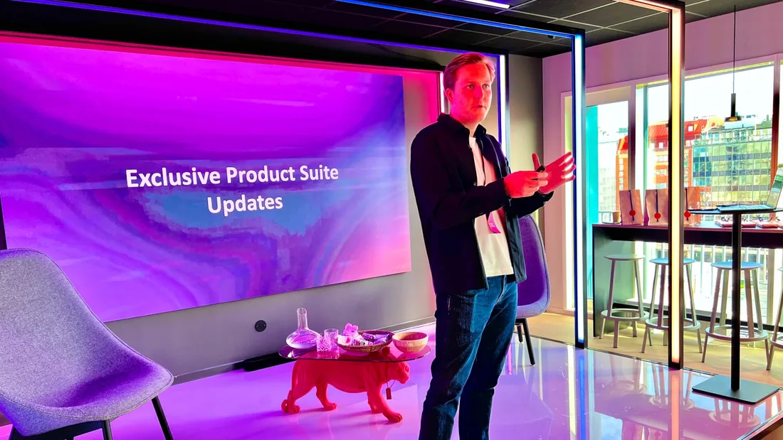 An Adway team member presenting exclusive product suite updates in the office
